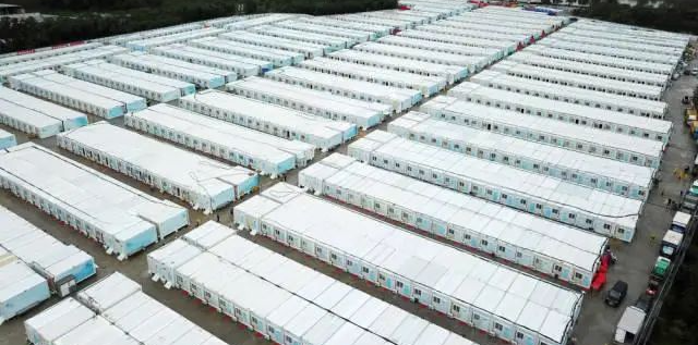 冲锋一线显担任！j9国际集团智能挖掘机助力长沙方舱医院建设